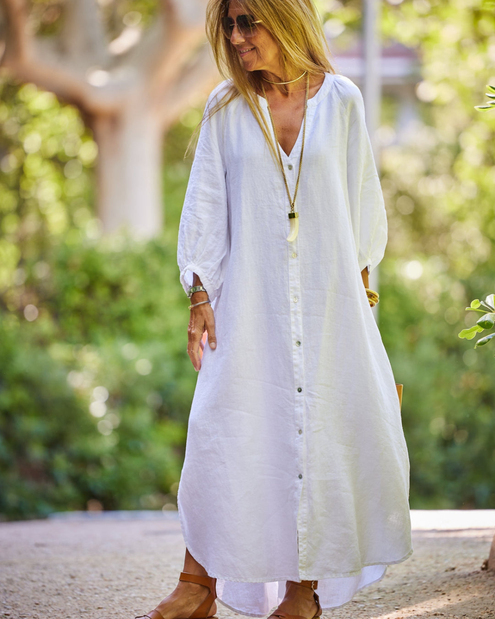 Chic women's solid color summer dress, flattering and versatile for vacation, day wear, or special events.