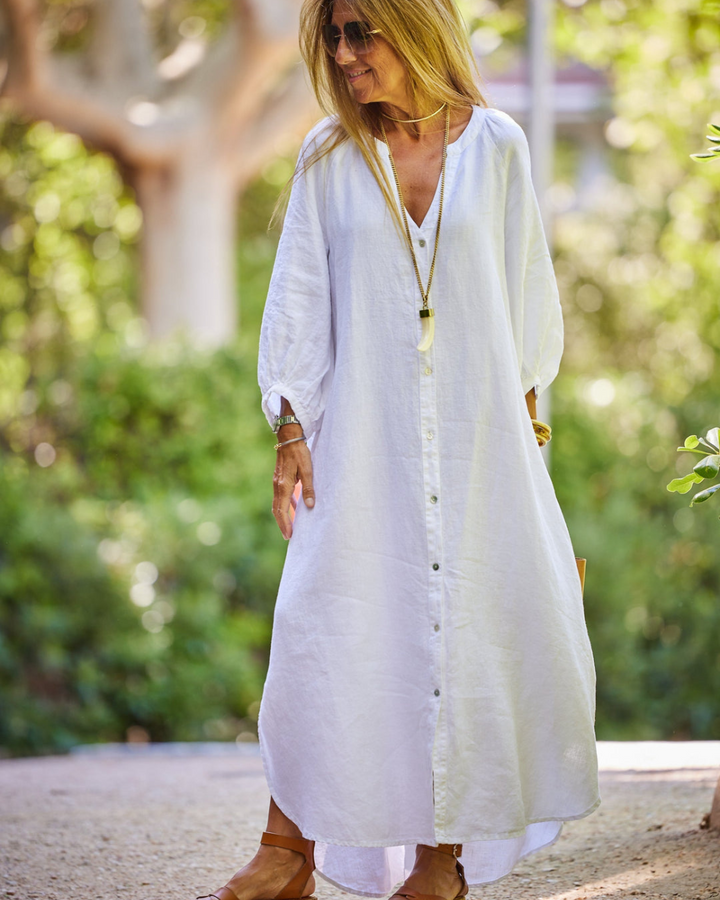 Chic women's solid color summer dress, flattering and versatile for vacation, day wear, or special events.