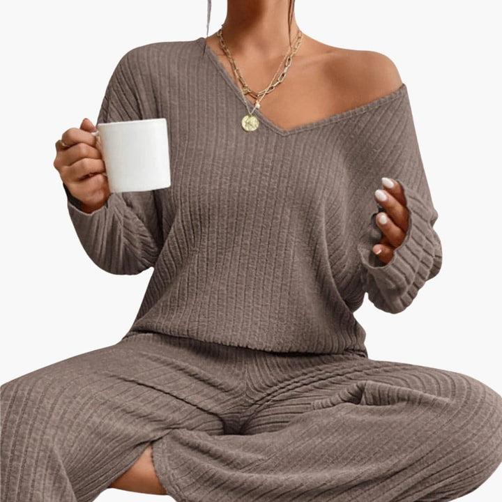 Comfortable women's ribbed loungewear set. Elegant long sleeve top & matching straight leg pants.