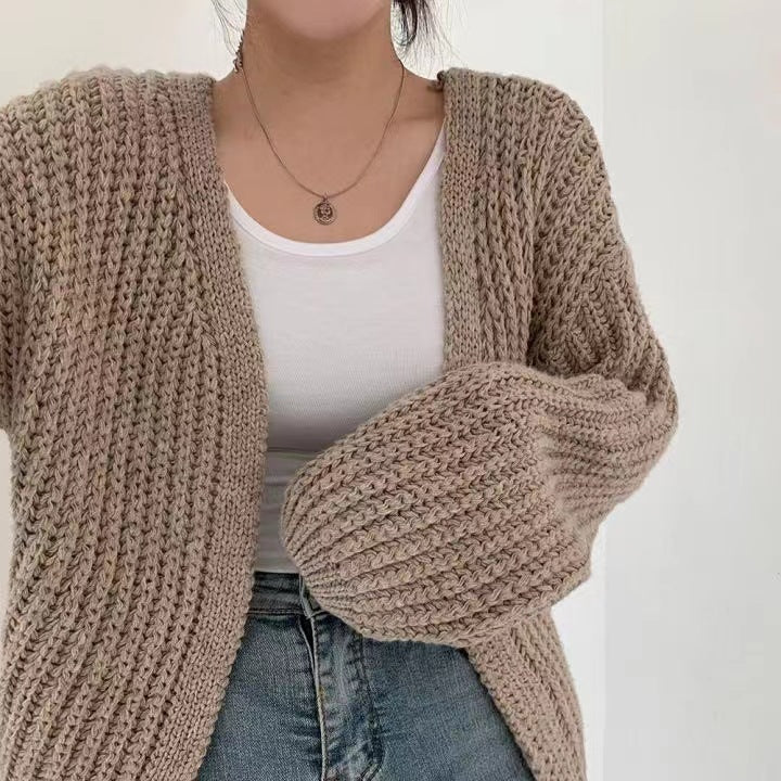 Comfortable women's oversized cardigan, great for stylish fall and autumn layering.