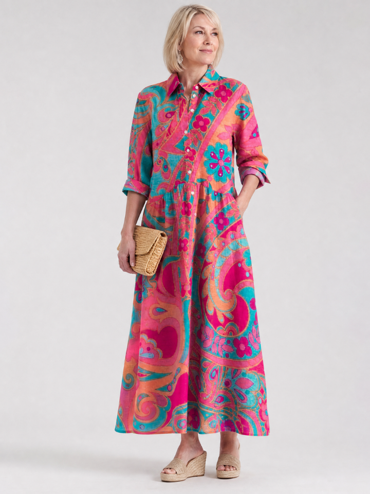 Women's stylish printed collared midi dress with button-front closure and short sleeves. Perfect for casual summer wear.