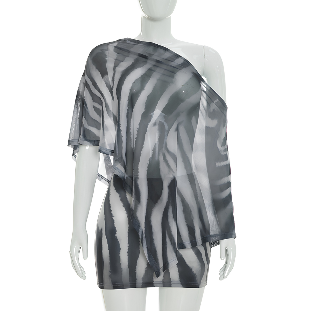 Elegant women's co-ord set: off-shoulder top and bodycon midi skirt with a distinctive claw print, versatile fashion.