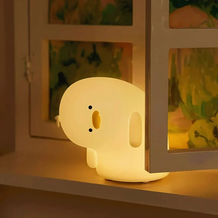 Rechargeable LED animal lamp with soft silicone; perfect kids night light & nursery accessory.
