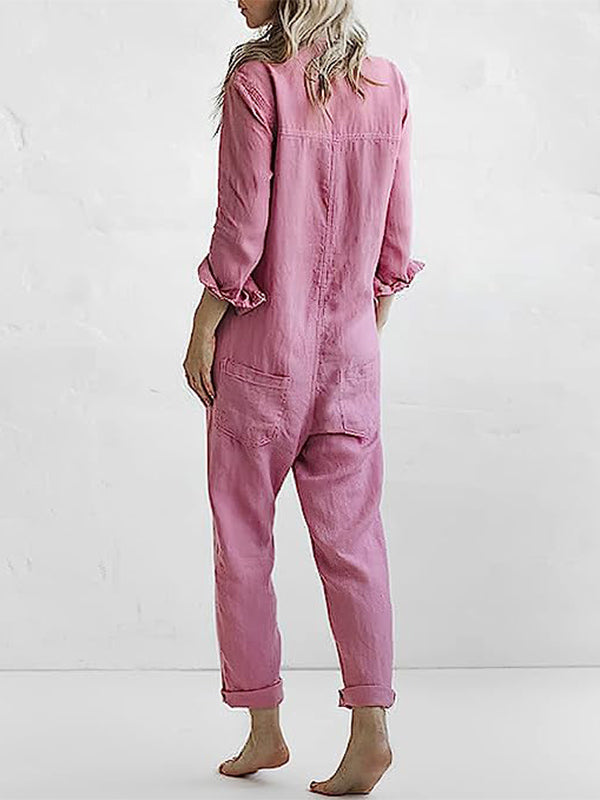 Woman wearing a comfortable long sleeve button-front jumpsuit, ideal for chic casual or evening wear.