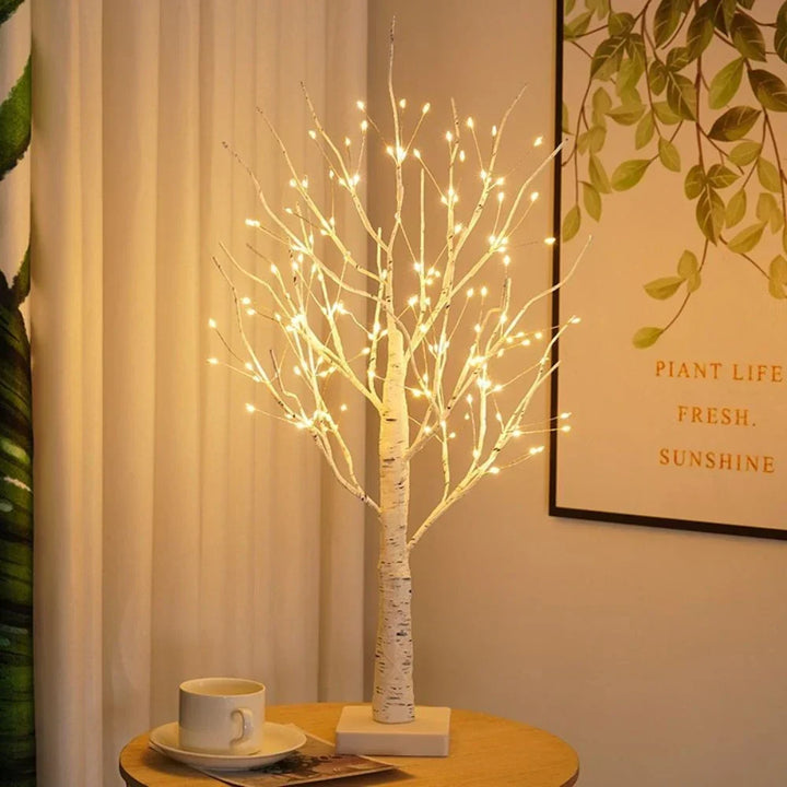 Unique LED birch tree lamp in bonsai style, offering warm white ambient lighting & flexible design for decor.