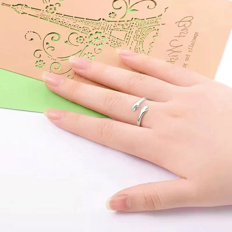 Modern adjustable hug ring, unisex design, a unique symbol of love & comfort, versatile.