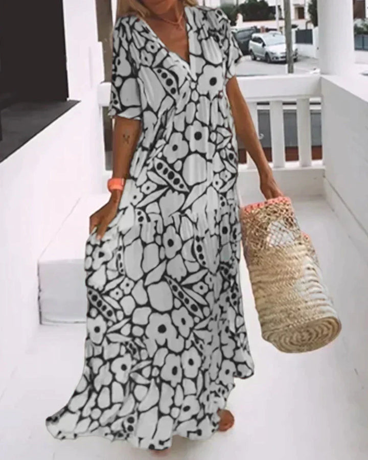 Lightweight women's swing maxi dress, comfortable and flowy, great for summer, beach, or vacation.