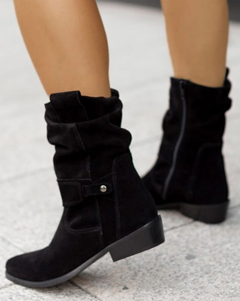 Stylish low-heel women's ankle boots, designed for comfort and everyday orthopedic support.