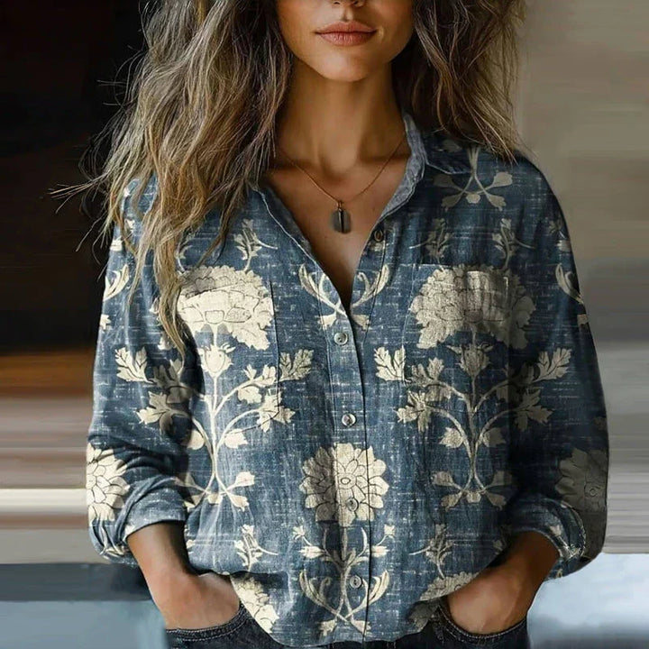 Relaxed fit women's bohemian blouse with vintage floral print, button front, and long sleeves. Ideal for casual summer.