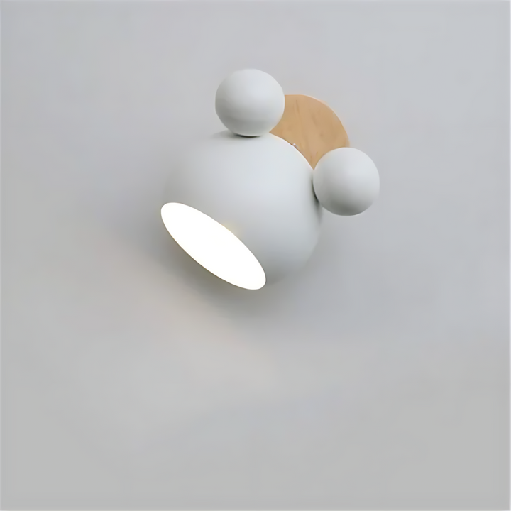 Close-up of a white Mickey Mouse LED wall light, perfect as a decorative night light in a kid's room.