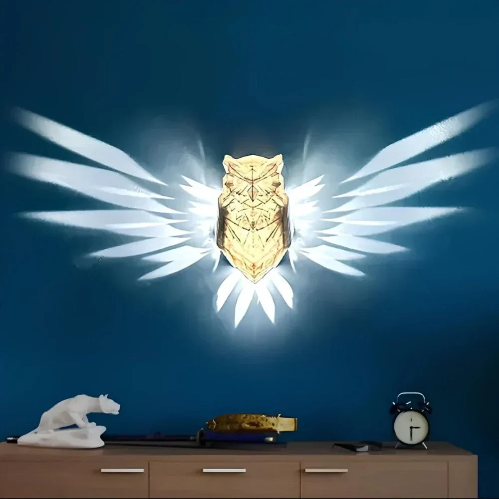 Home decor LED wall light with luminous wing projection, Nvroome Lights artistic accent sconce.