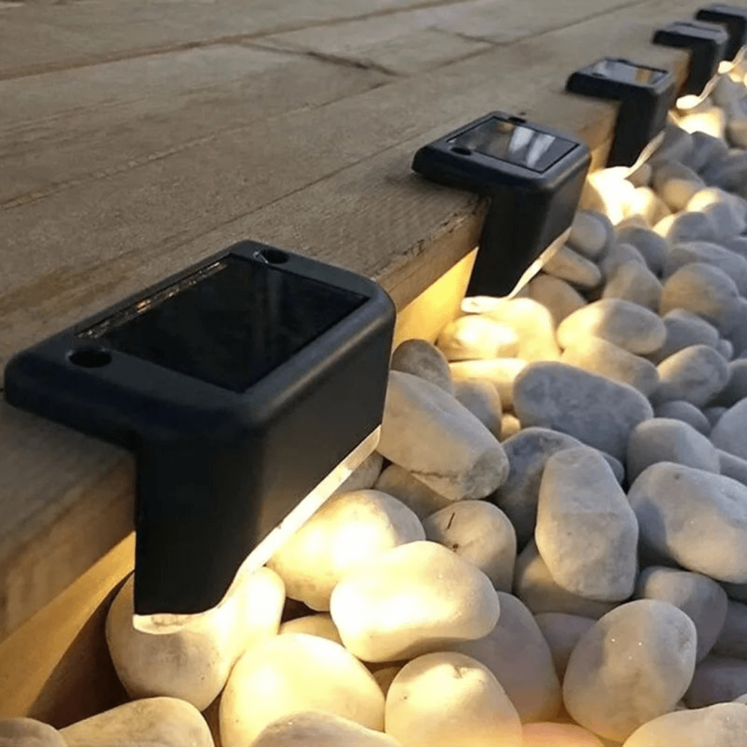 Wireless solar LED step lights provide safe, decorative outdoor lighting for steps, gardens, and patios. Self-adhesive.