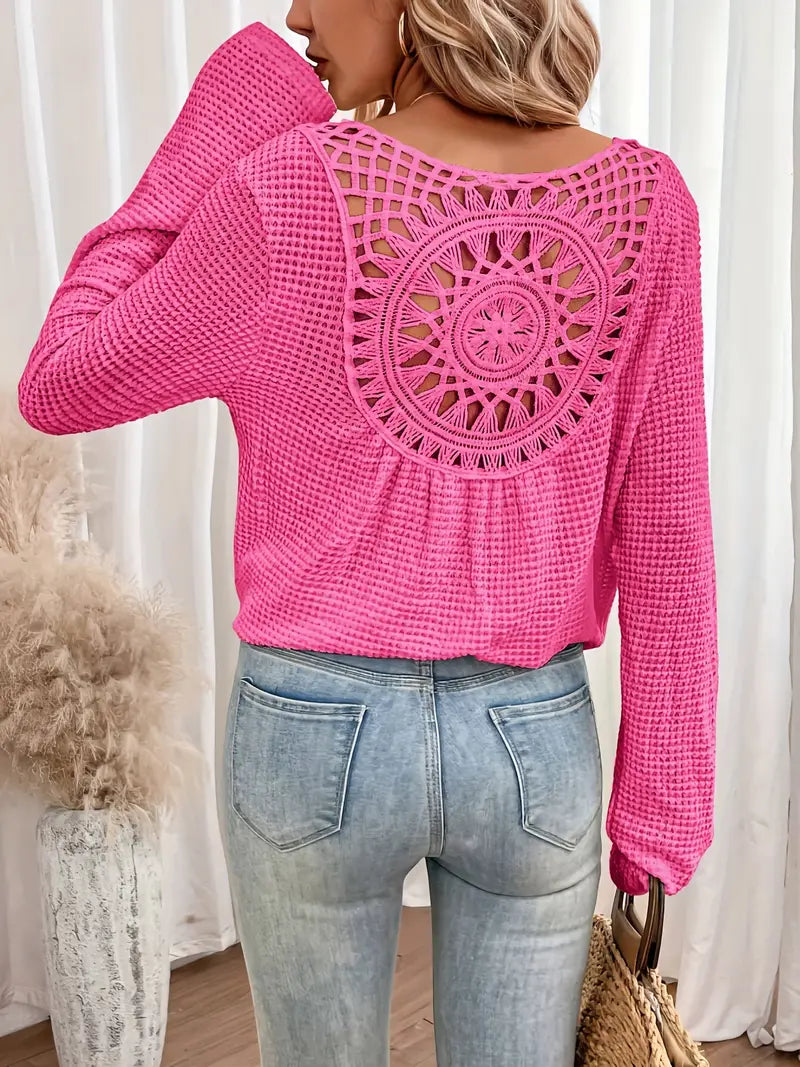 Women's flowy bohemian shirt, perfect for a casual beach outfit or summer festival style.