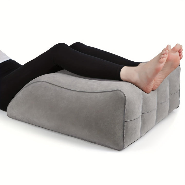 Inflatable leg elevation pillow, designed for optimal leg support, circulation & restorative sleep.