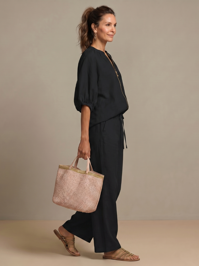 Comfortable wide-leg pants and a chic zip-front top in this women's set.