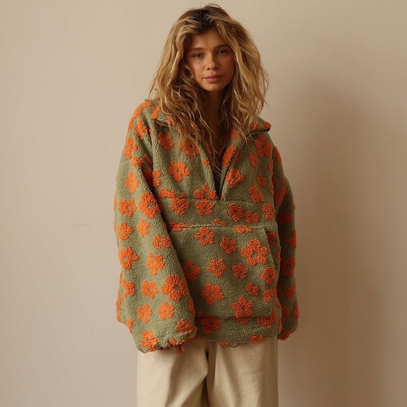 Fashionable women's floral oversized half-zip pullover, cozy and soft knit sweater for chic autumn style.