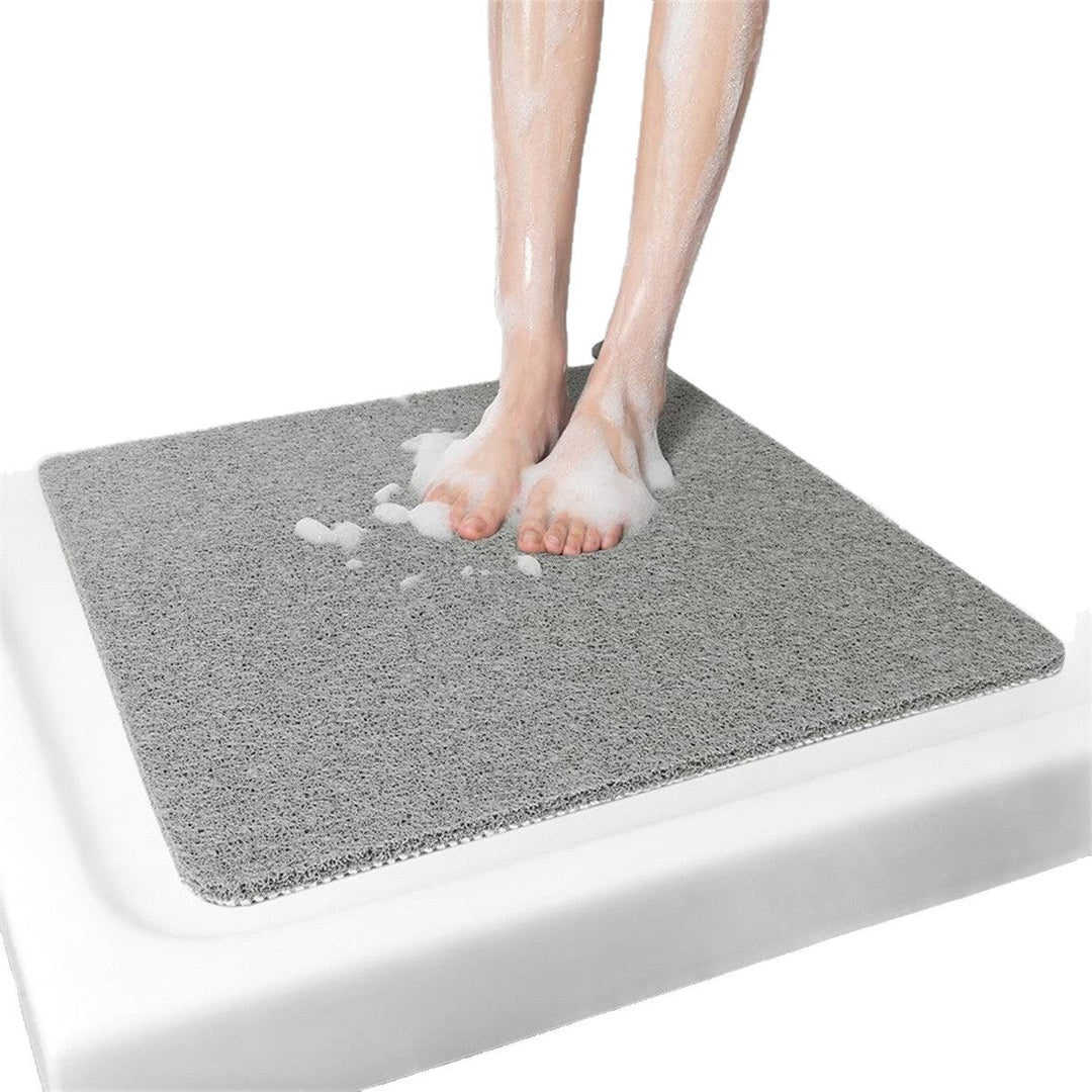 Versatile drainage floor mat, ideal for bathroom, shower, and kitchen, providing anti-slip safety.