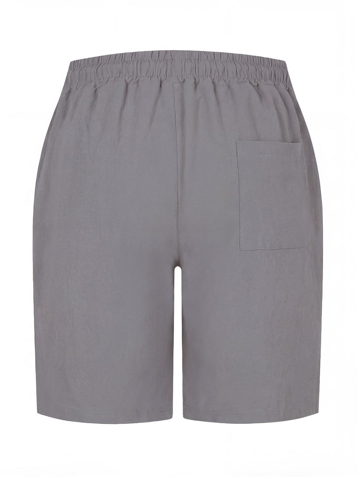 Men's easy wear summer shorts with drawstring & pockets, offering relaxed comfort for warm days.