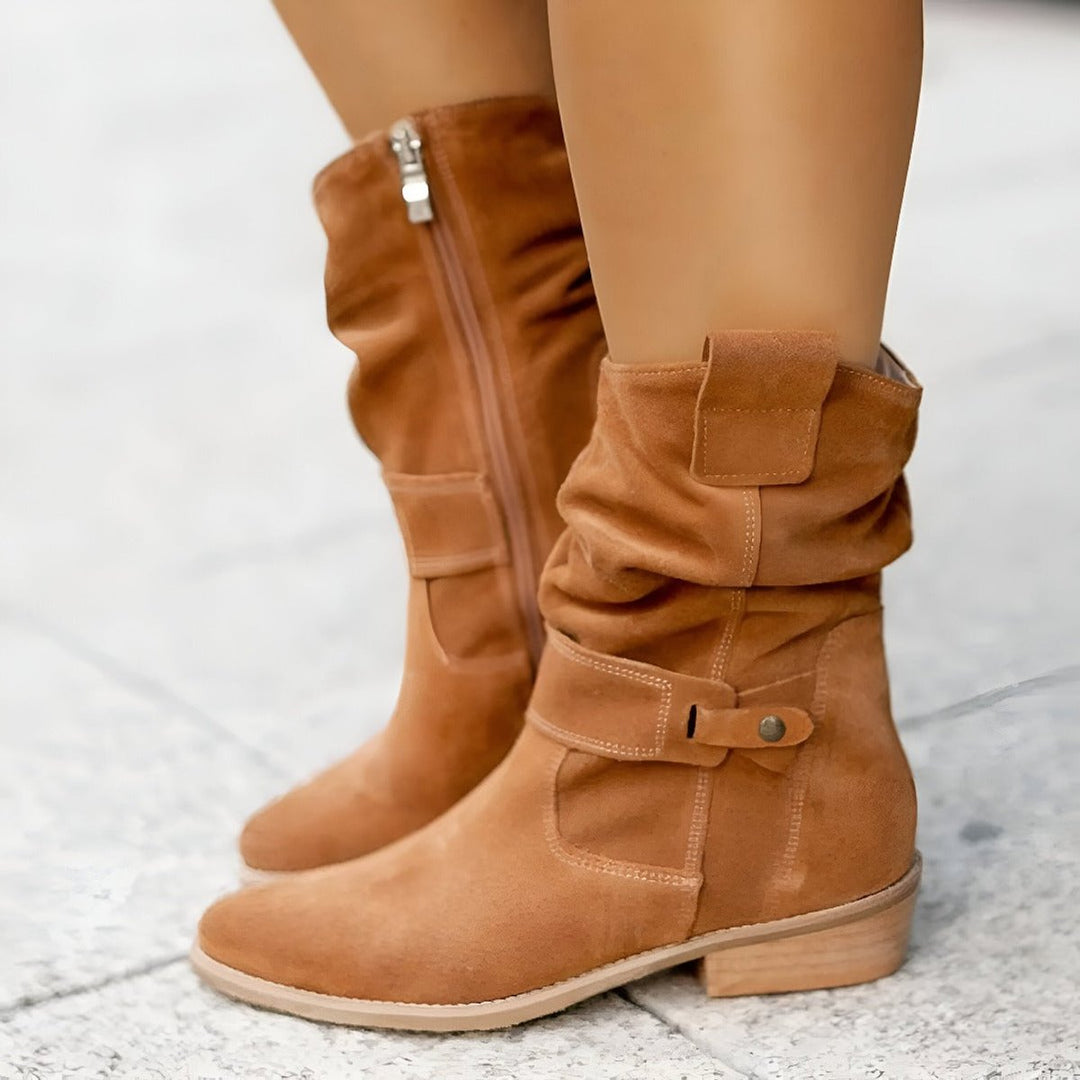 Elegant women's slouchy knee-high boots featuring a comfortable block heel & round toe. Ideal for casual fashion.