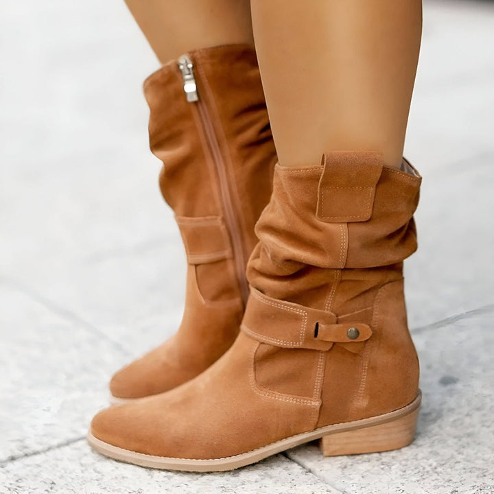 Elegant women's slouchy knee-high boots featuring a comfortable block heel & round toe. Ideal for casual fashion.