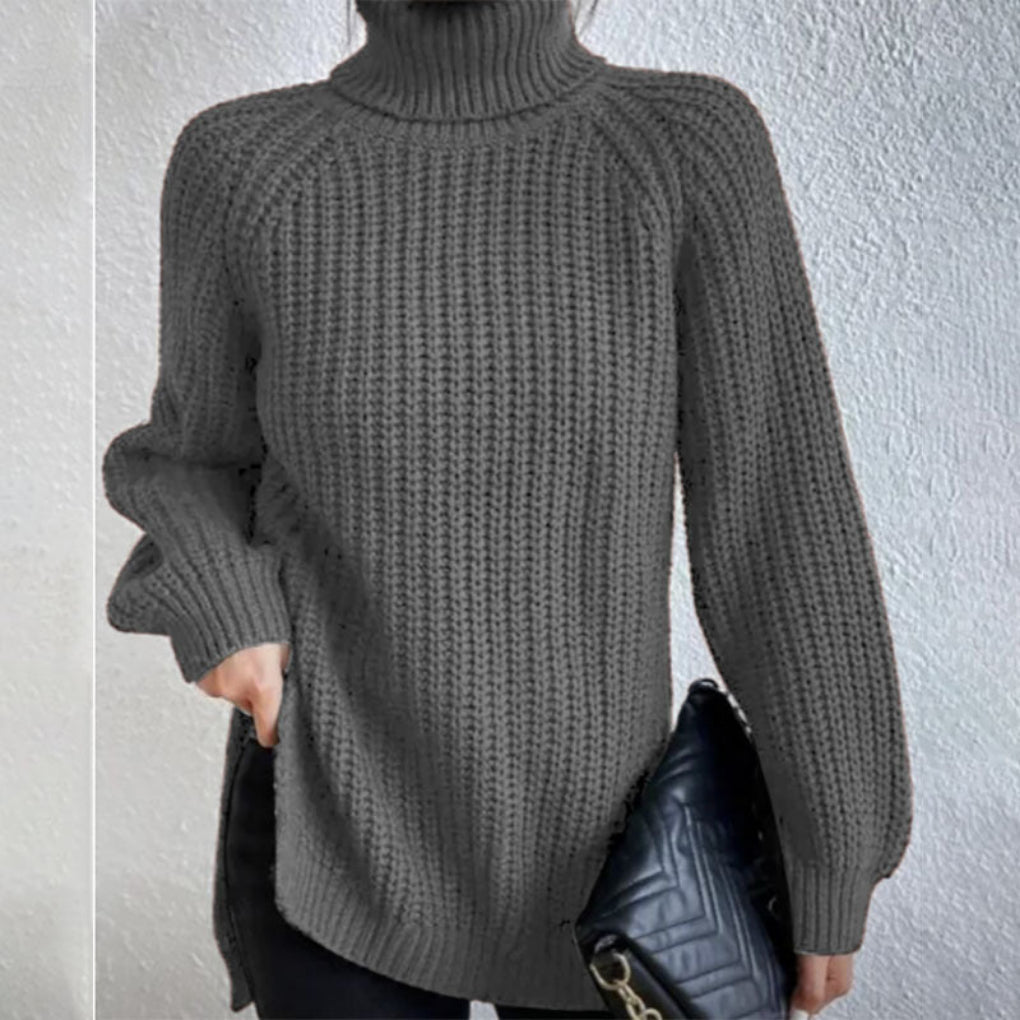 Warm winter wear: Women's solid turtleneck pullover sweater. Elegant split hem and long sleeves.
