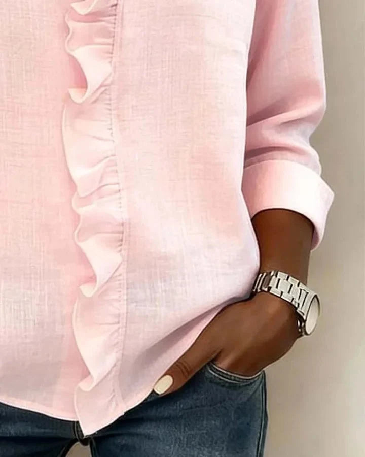 Flowy women's lightweight blouse with V-neck and ruffled long sleeves, adding a graceful touch to outfits.