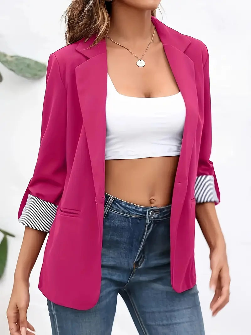 Sophisticated women's blazer, a chic tailored jacket for professional business attire and office wear.