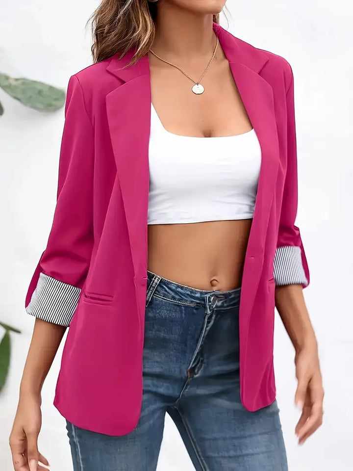 Sophisticated women's blazer, a chic tailored jacket for professional business attire and office wear.