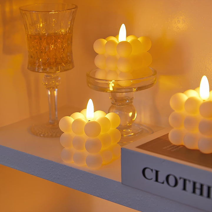 Warm glow flameless LED pillar candles, battery-operated for event & home ambiance.