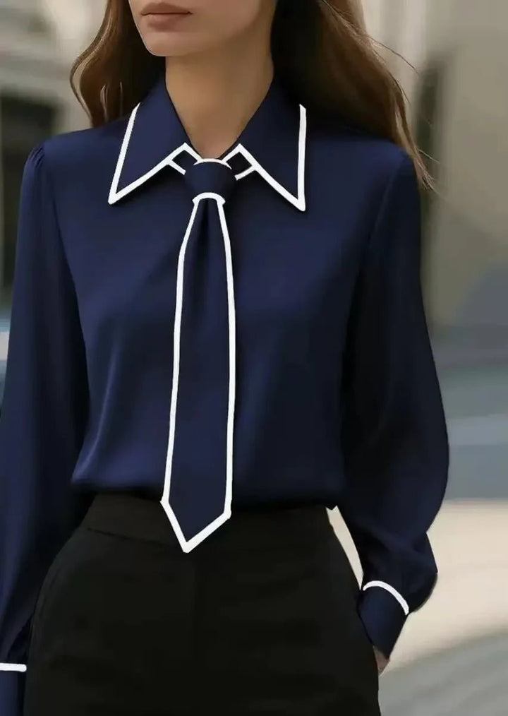 Versatile women's long sleeve tie blouse in an elegant contrast design. Chic office wear and classic refined style.