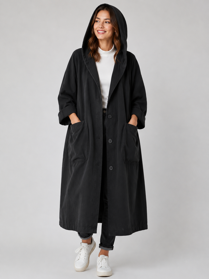 Fashionable women's waterproof long trench coat, an all-season outerwear essential for ladies.
