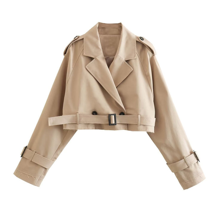 Chic women's cropped belted trench coat, perfect for modern city fashion & transitional weather. Elegant office outerwear.