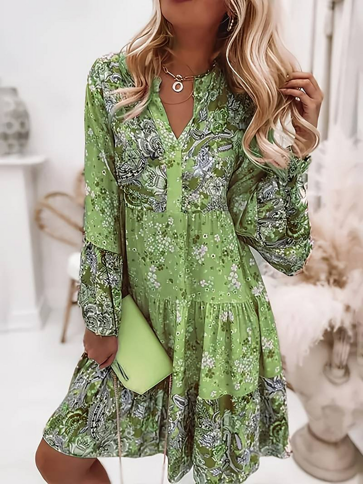 Flowy women's bohemian floral print dress, long sleeve, for stylish comfort and everyday chic.