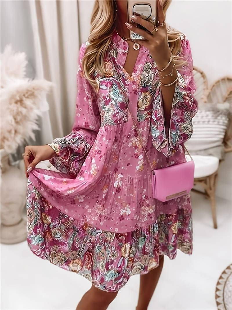 Women's floral bohemian dress with long sleeves & ruffle hem for free-spirited style, perfect for casual wear.
