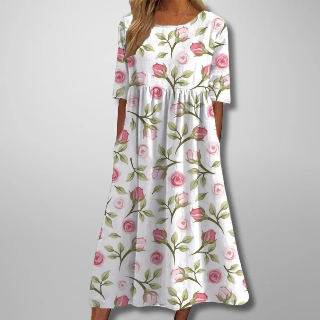 Everyday women's floral midi dress. Relaxed fit, navy blue. Comfortable & stylish for casual spring/summer days.