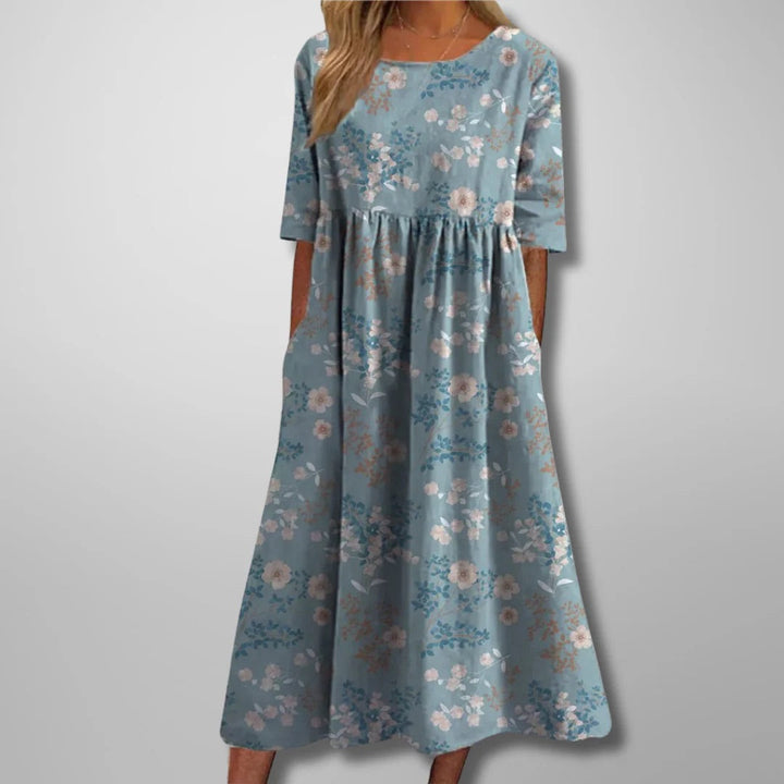 Elegant women's relaxed floral midi dress. Mint green, versatile for spring/summer events & everyday wear.