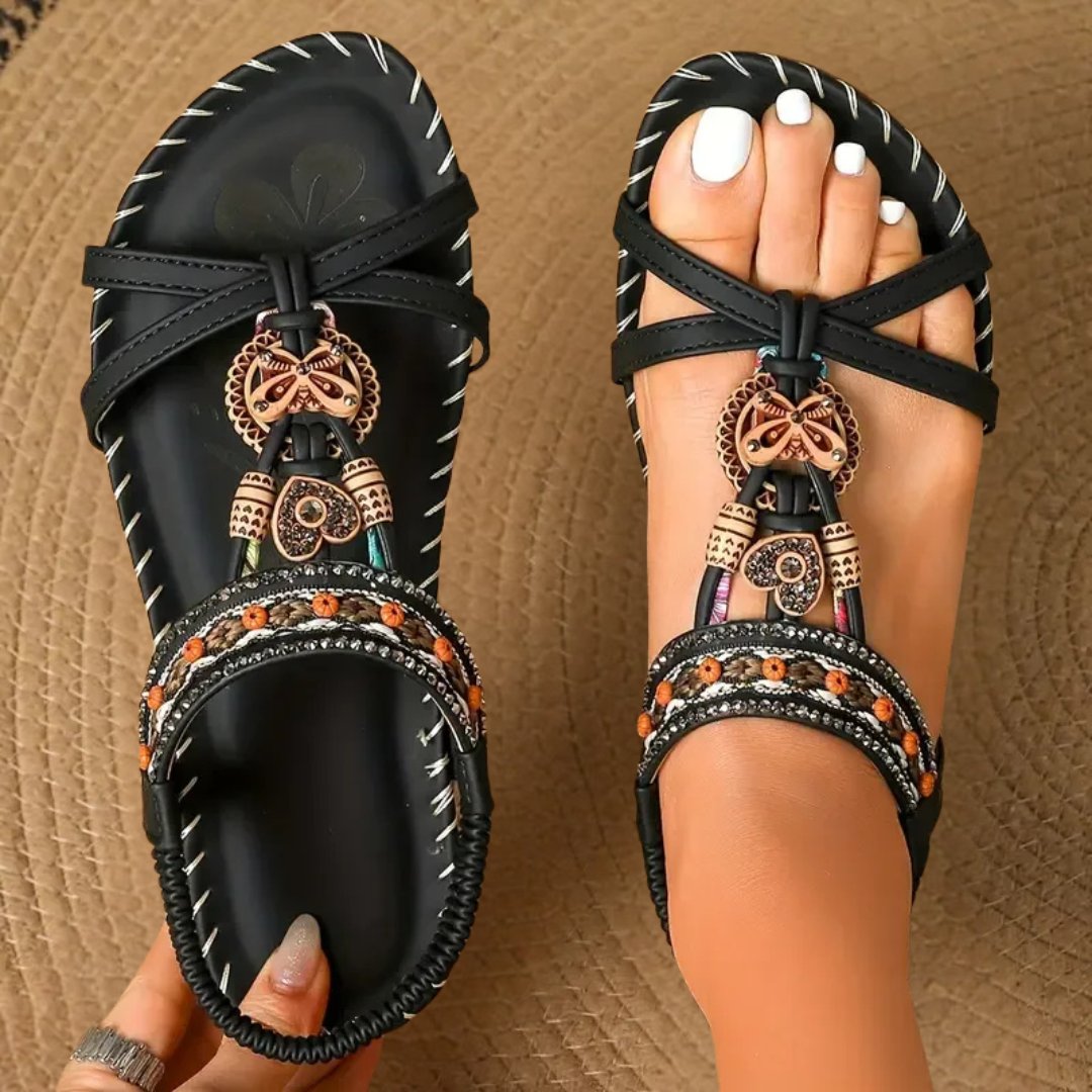 Stylish boho beaded flat sandals for women, perfect casual or vacation footwear for beach comfort.