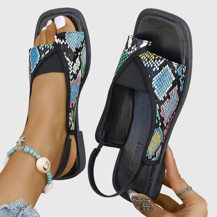 Women's square-toe open-toe flat sandals. Comfortable slip-on summer footwear for trendy casual looks.