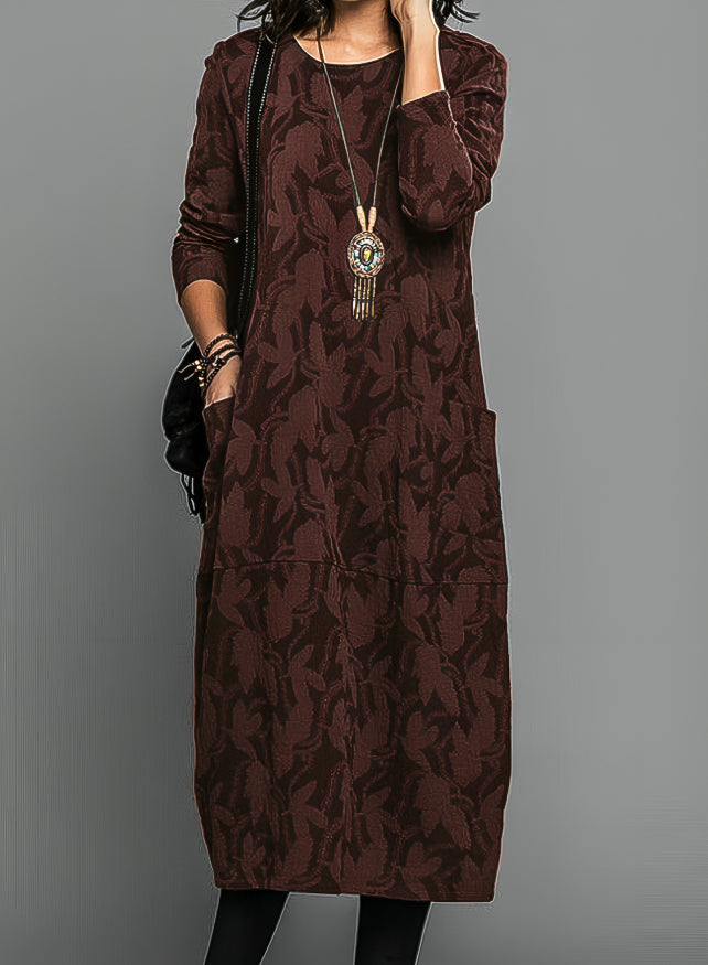 Versatile women's elegant long-sleeve midi dress for winter, ideal as a party or occasion dress in cold weather.