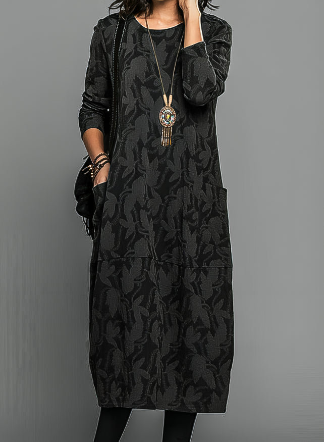 Stylish women's long-sleeve midi dress, elegant printed design, offering sophisticated warmth for winter and fall fashion.