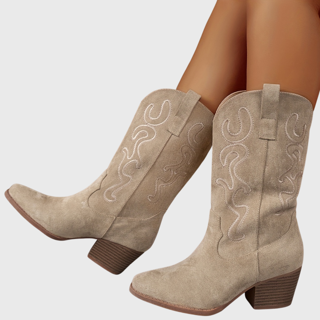 Comfortable women's wide-calf cowboy boots with a sturdy block heel for everyday western style.