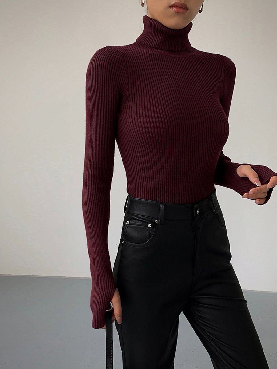 Elegant women's ribbed turtleneck sweater, perfect for versatile, chic autumn & winter fashion.