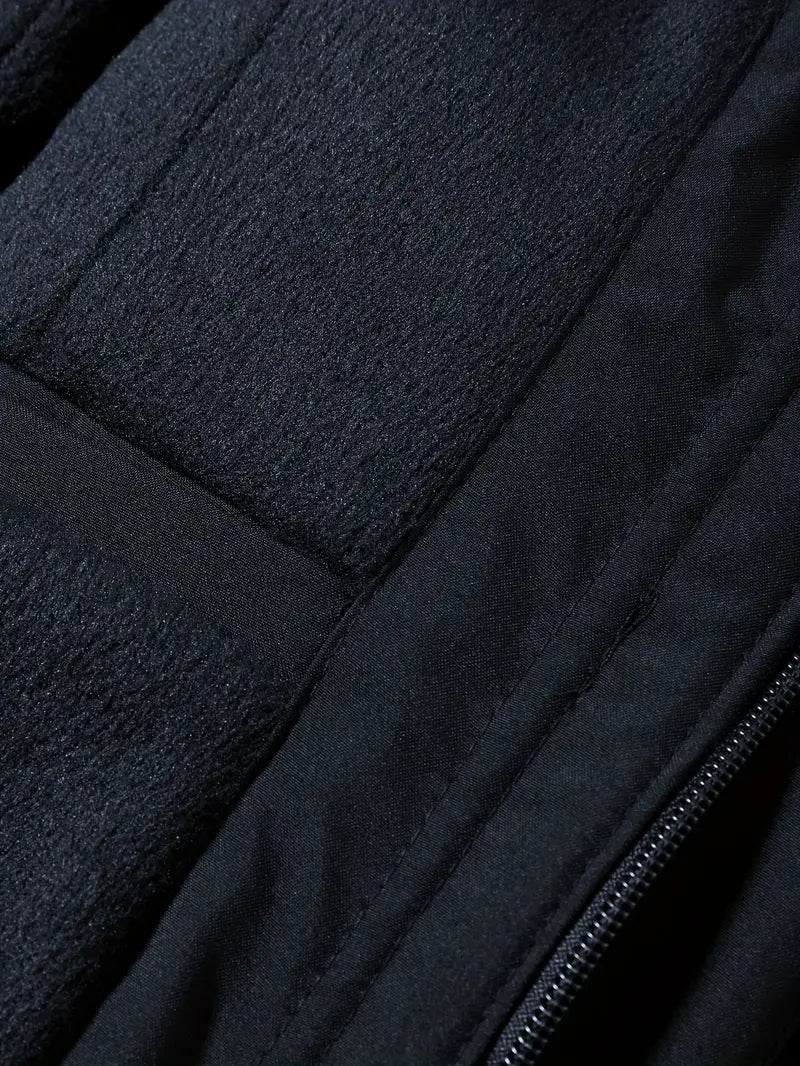 Durable men's waterproof parka. Padded winter coat for cold weather adventures.