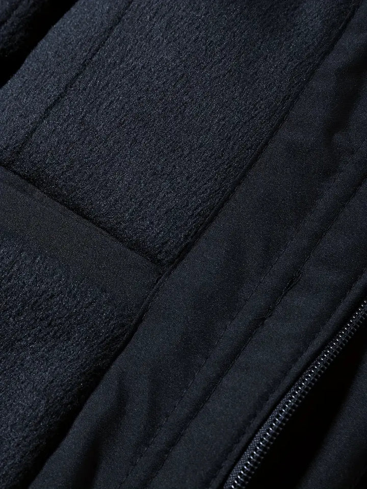 Durable men's waterproof parka. Padded winter coat for cold weather adventures.