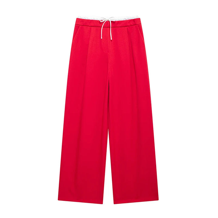 Model wearing comfortable women's flowy wide-leg lounge pants, showcasing relaxed fit and everyday style.