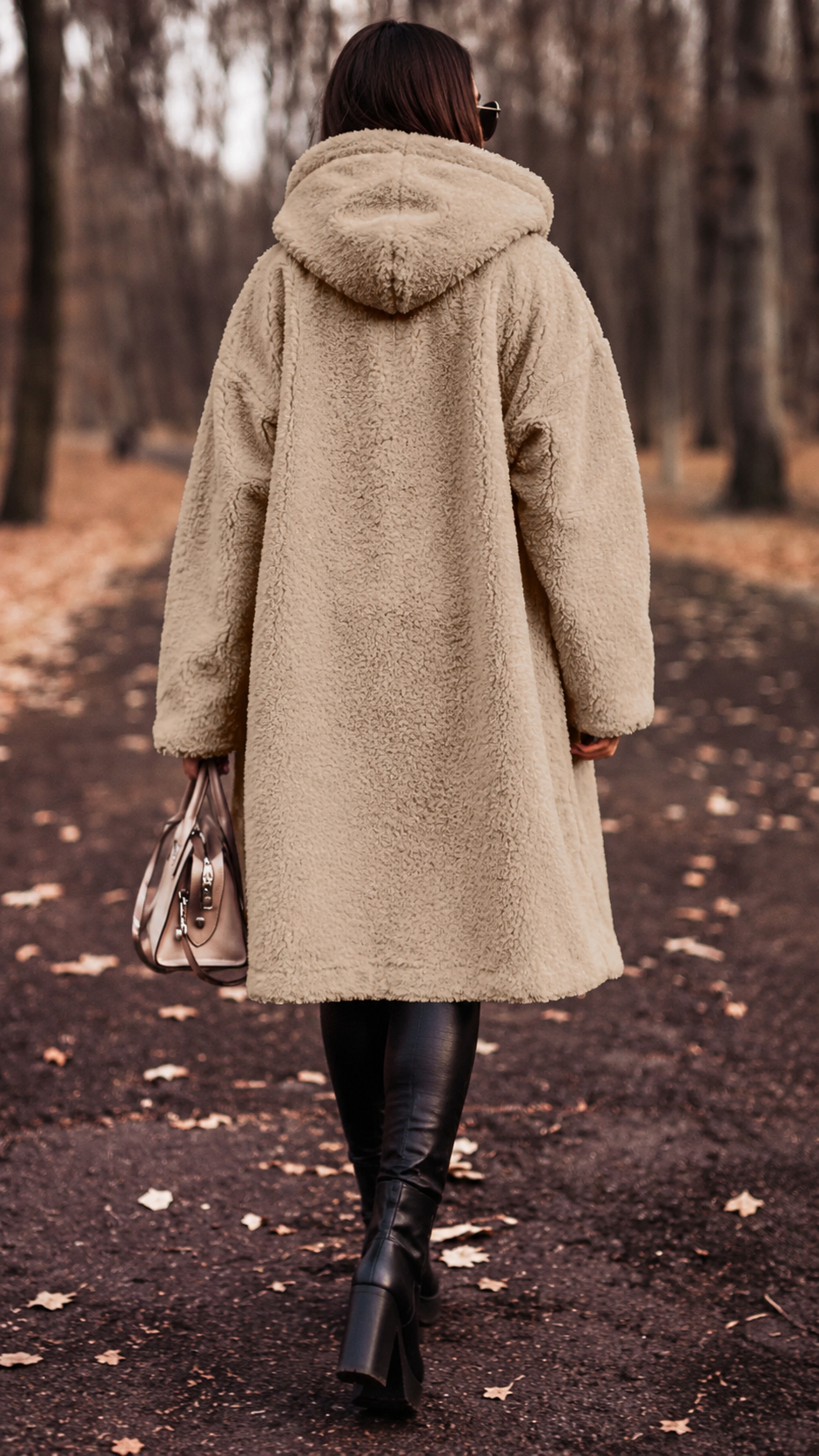 Elegant women's hooded winter coat, knee-length for cozy cold weather fashion.