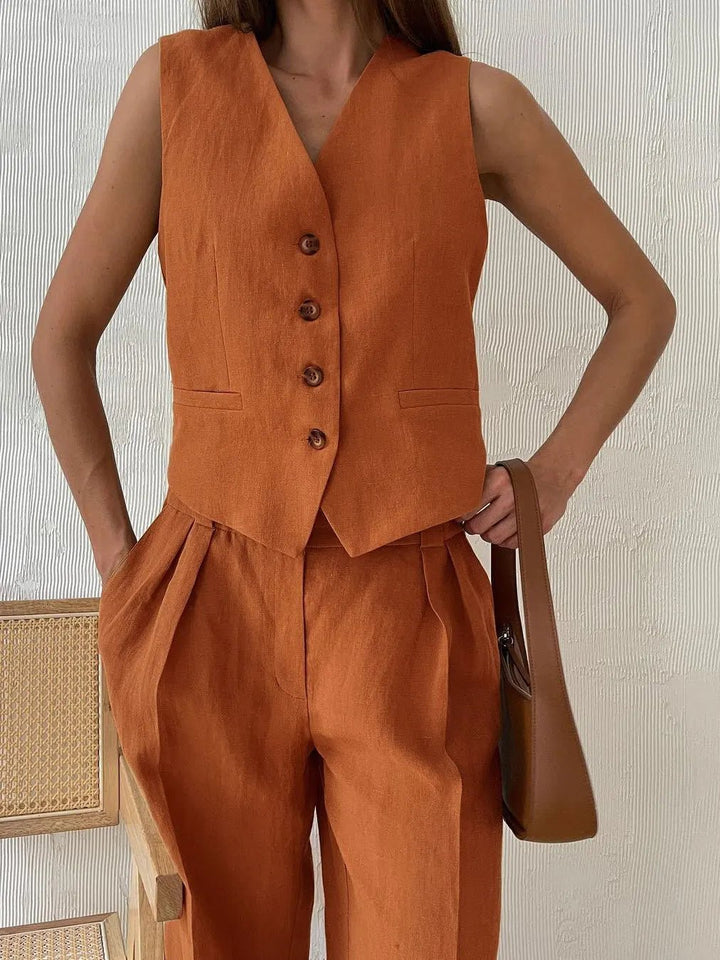 Stylish two-piece set: A chic vest and elegant pleated wide-leg trousers for a modern woman.