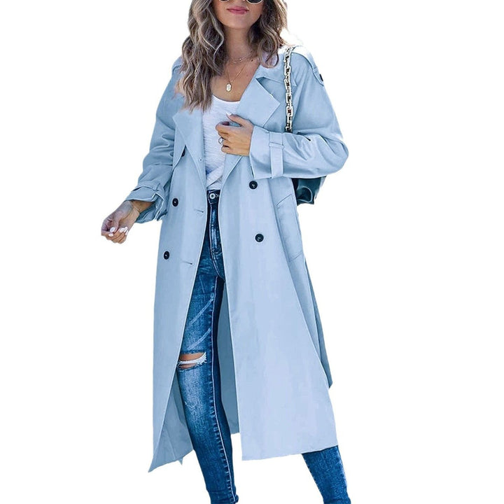 Modern classic women's oversized trench, double-breasted design & tie belt for contemporary elegant outerwear.