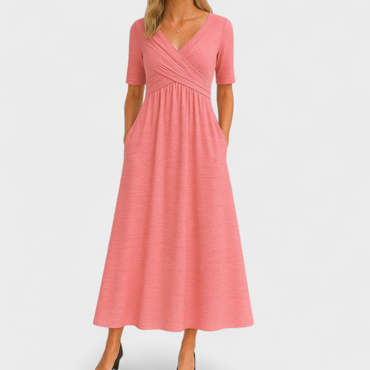 Modern women's V-neck midi dress, elegant & versatile for all occasions. Flattering short sleeve chic design.