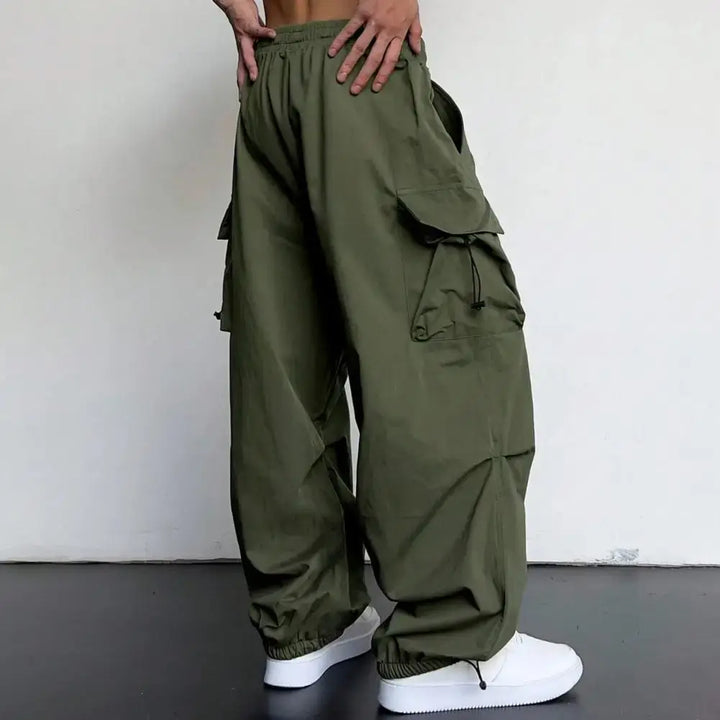 Stylish unisex cargo joggers, relaxed fit with elastic waist and cuffs for ultimate comfort.